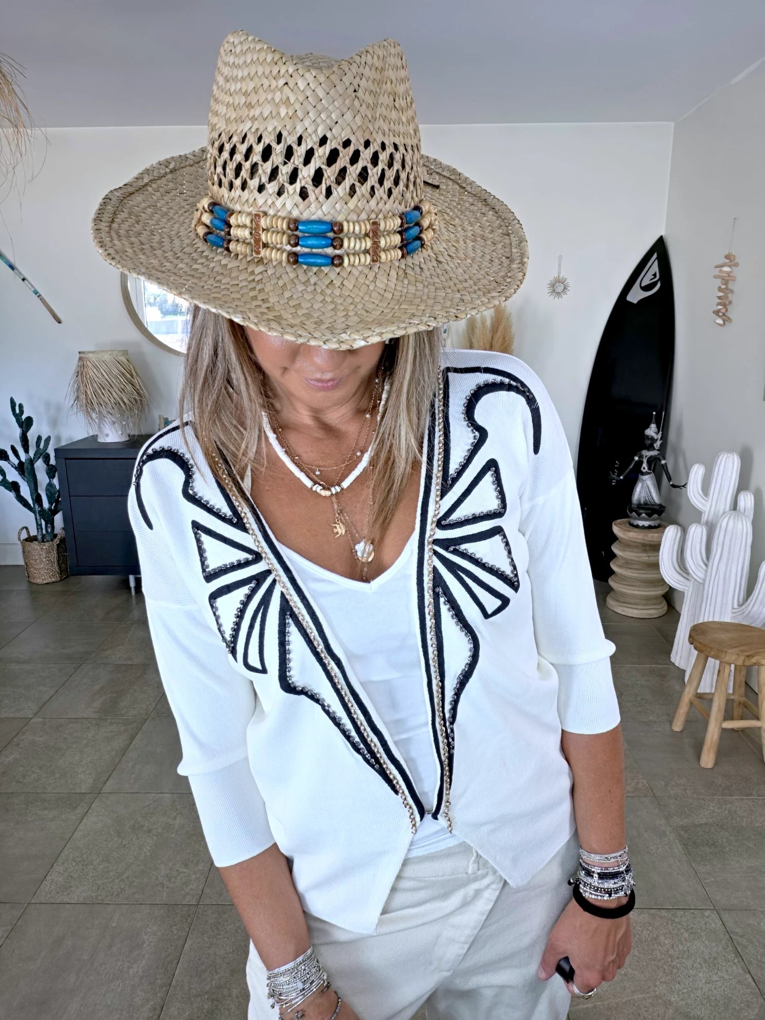 Cardigan blanc à encolure en V profonde