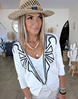 Cardigan blanc à encolure en V profonde