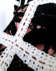 Pull ajouré noir et écru