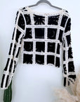 Pull ajouré noir et écru