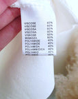 Cardigan blanc à encolure en V profonde