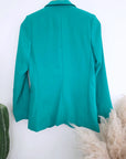 Veste cintrée verte avec pins éclair