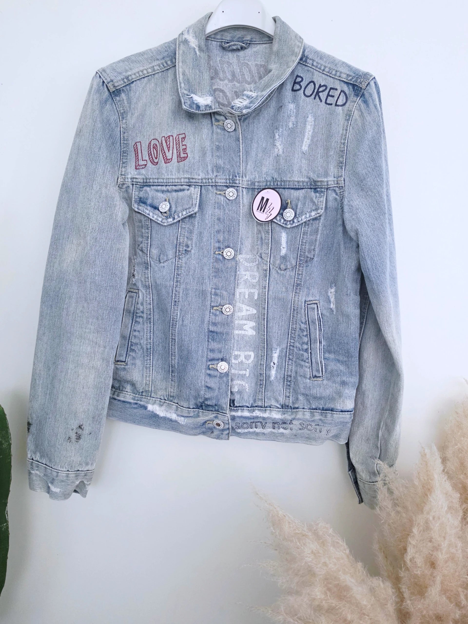 Veste en jean entièrement customisée