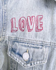 Veste en jean entièrement customisée