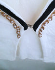 Cardigan blanc à encolure en V profonde