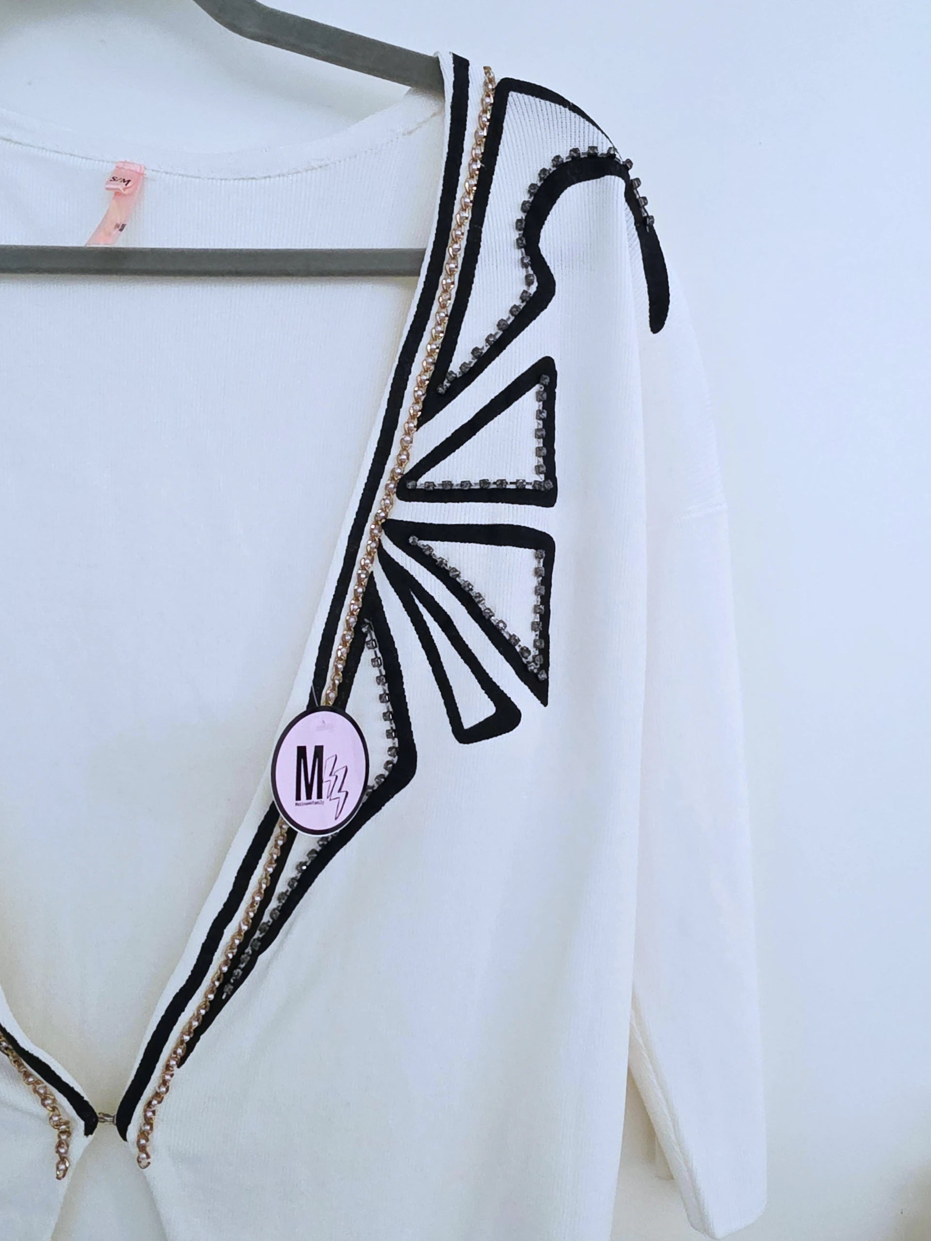 Cardigan blanc à encolure en V profonde