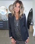 Blazer noir à épaulettes en cuir et clouté