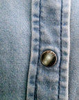 Chemise en denim bleu délavé
