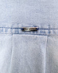 Chemise en denim bleu délavé