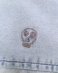 Chemise en denim bleu délavé
