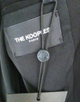 Blazer noir à épaulettes en cuir et clouté