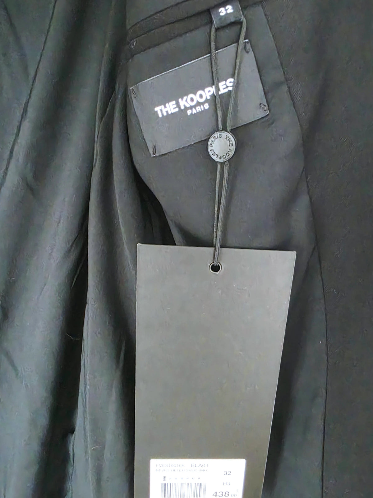 Blazer noir à épaulettes en cuir et clouté
