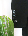 Blazer noir à épaulettes en cuir et clouté