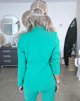 Veste cintrée verte avec pins éclair