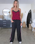 Pantalon noir à bandes latérales - 𝐌𝐚𝐫𝐢𝐧𝐚𝟒𝟒𝐟𝐚𝐦𝐢𝐥𝐲
