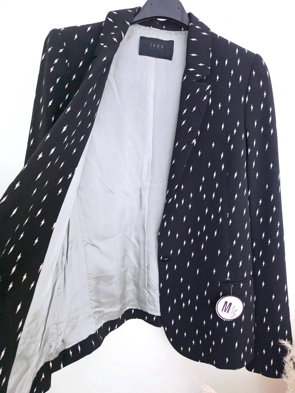 Veste noire à imprimé éclair blanc