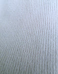 Cardigan blanc à encolure en V profonde