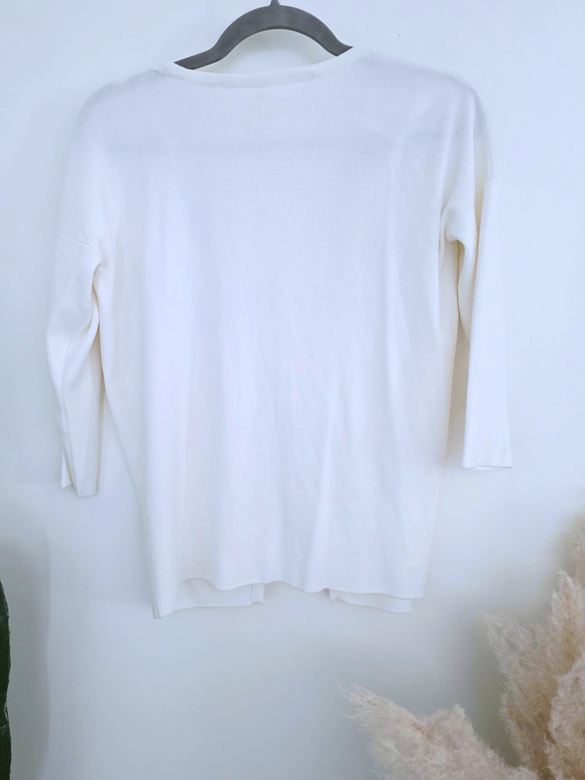 Cardigan blanc à encolure en V profonde