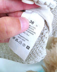 Cardigan en maille écru