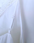 Débardeur blanc à bordures en dentelle