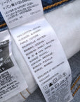 Short bleu destroy Levi's + ceinture tissu