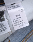 Short bleu destroy Levi's + ceinture tissu
