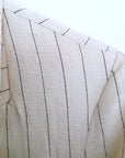 Veste blanc cassé à fines rayures
