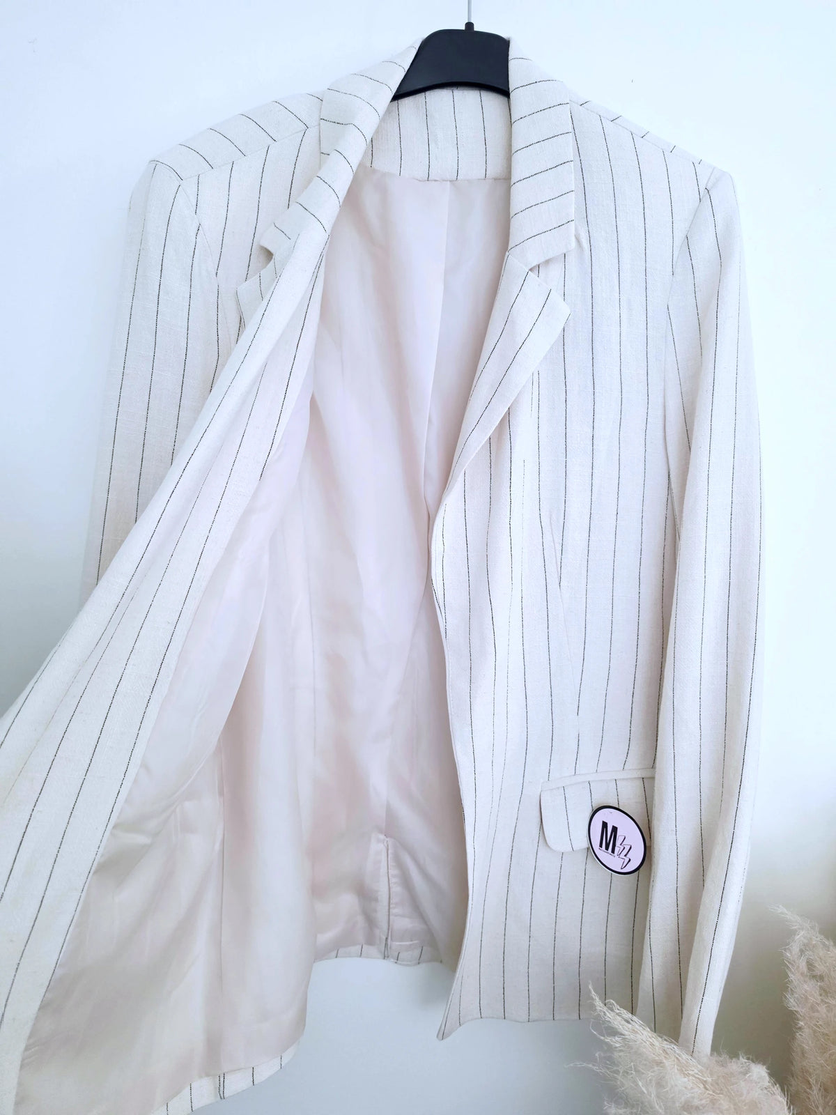 Veste blanc cassé à fines rayures