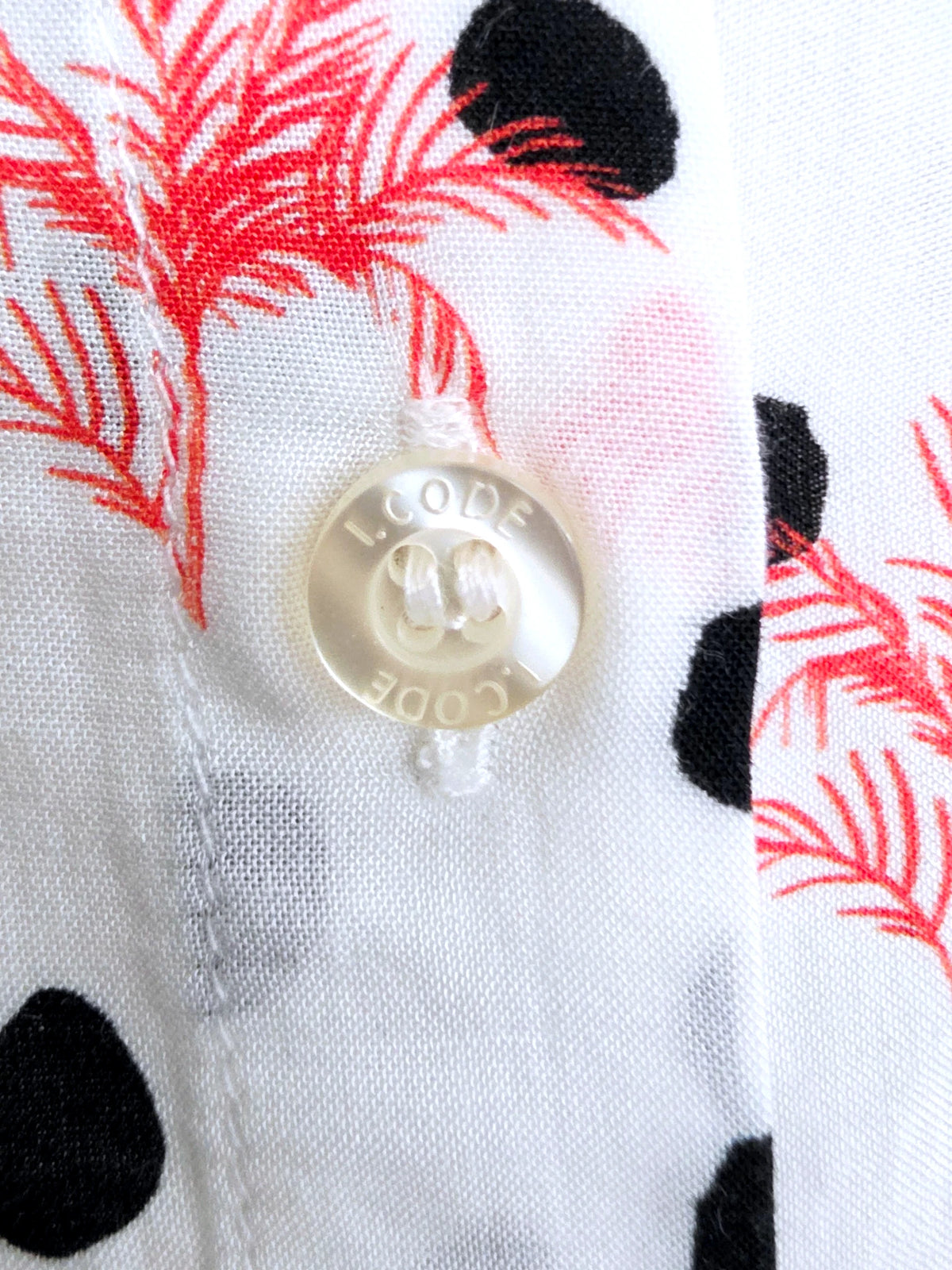 Chemise blanche à imprimé palmier et petit pois