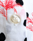 Chemise blanche à imprimé palmier et petit pois