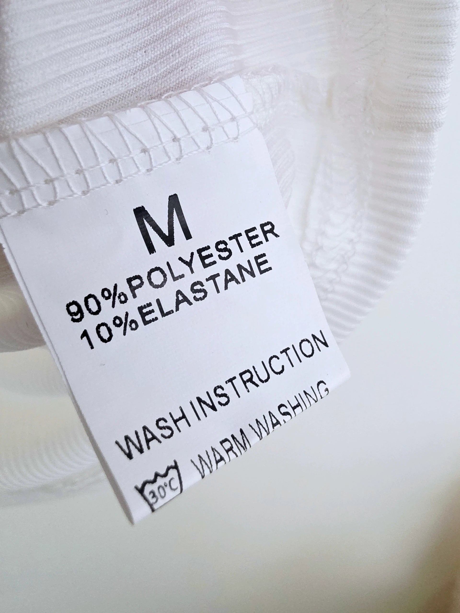 Débardeur blanc à maille côtelée en lycra