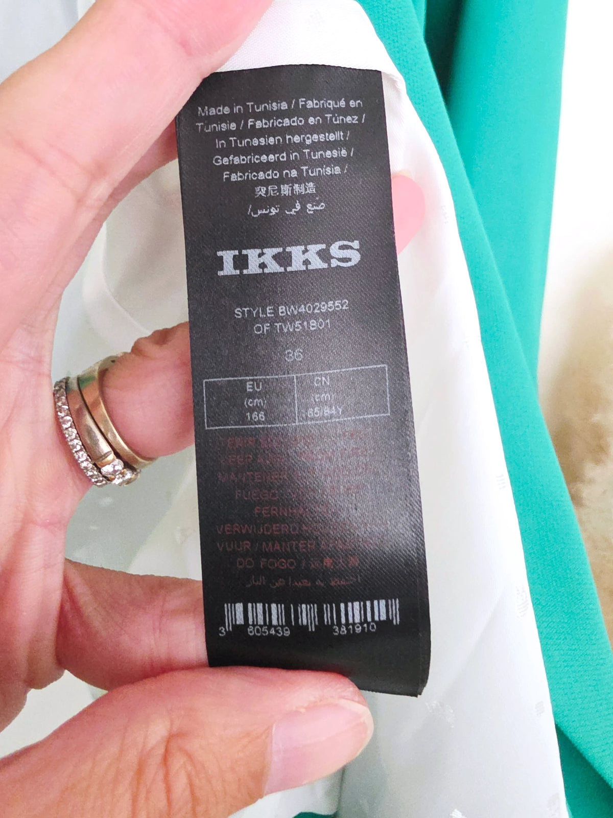Veste cintrée verte avec pins éclair