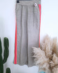Pantalon taupe à bandes fluo