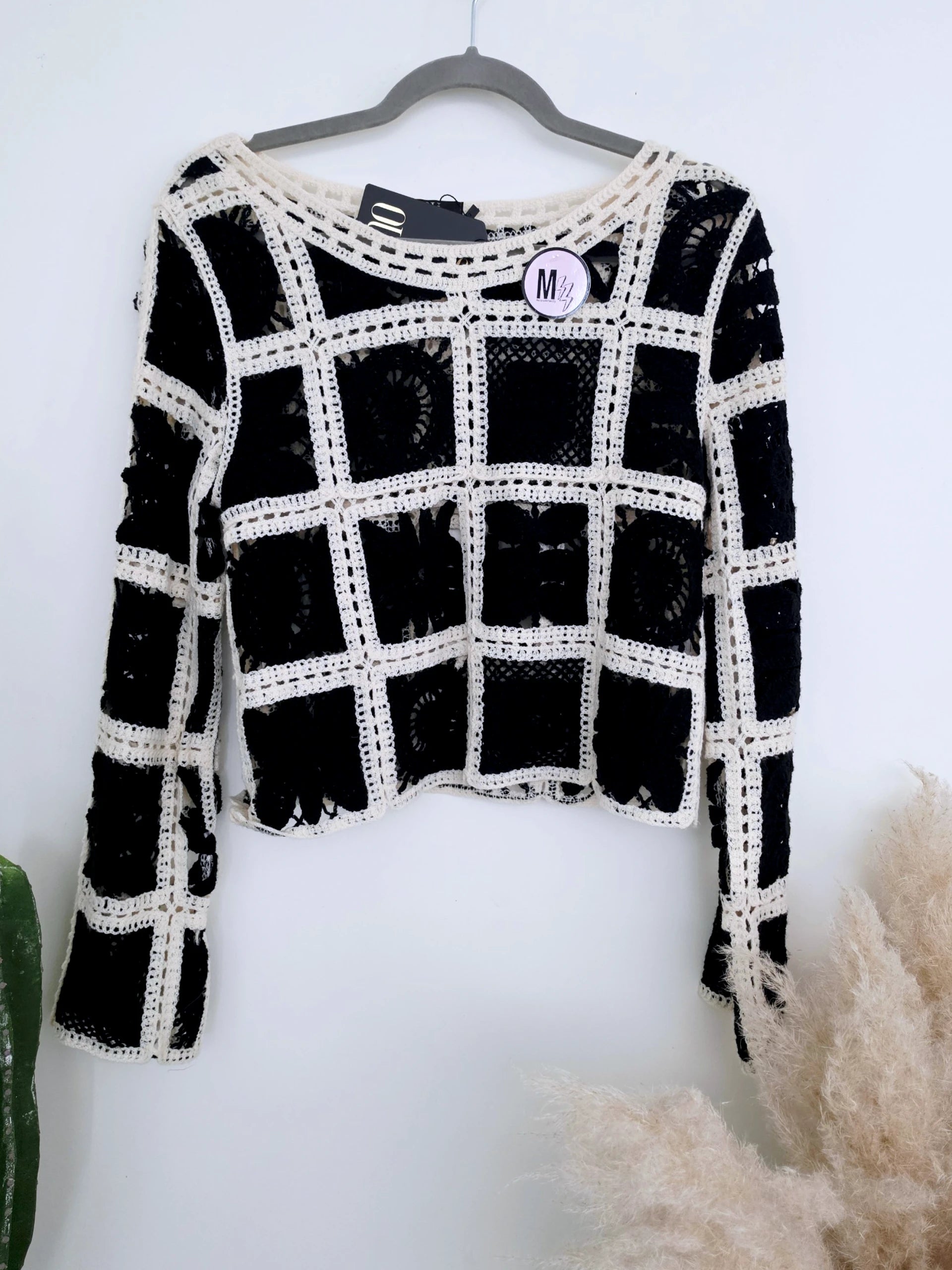 Pull ajouré noir et écru