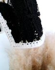 Pull ajouré noir et écru