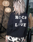 Pull noir à inscriptions au dos - 𝐌𝐚𝐫𝐢𝐧𝐚𝟒𝟒𝐟𝐚𝐦𝐢𝐥𝐲
