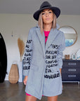 Manteau mi-saison à tag