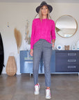 Pull torsadé fuchsia