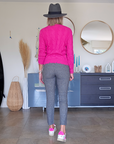 Pull torsadé fuchsia