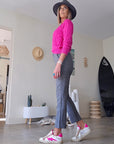 Pull torsadé fuchsia