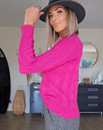 Pull torsadé fuchsia