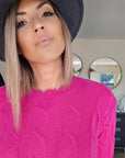 Pull torsadé fuchsia
