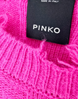 Pull torsadé fuchsia
