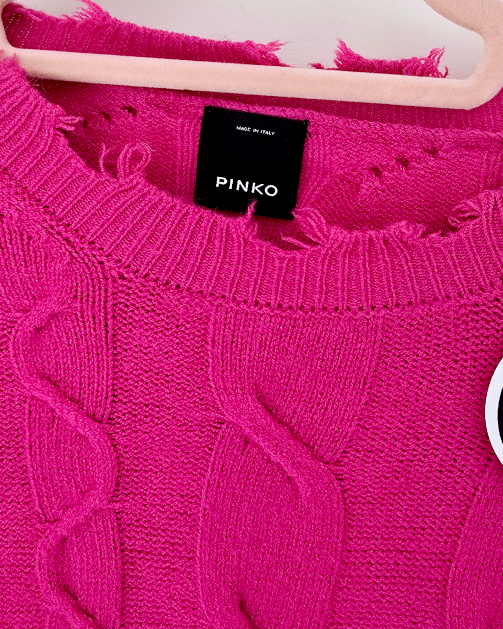 Pull torsadé fuchsia