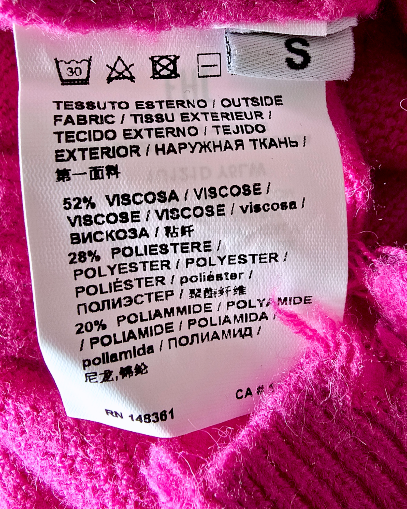 Pull torsadé fuchsia