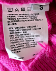 Pull torsadé fuchsia