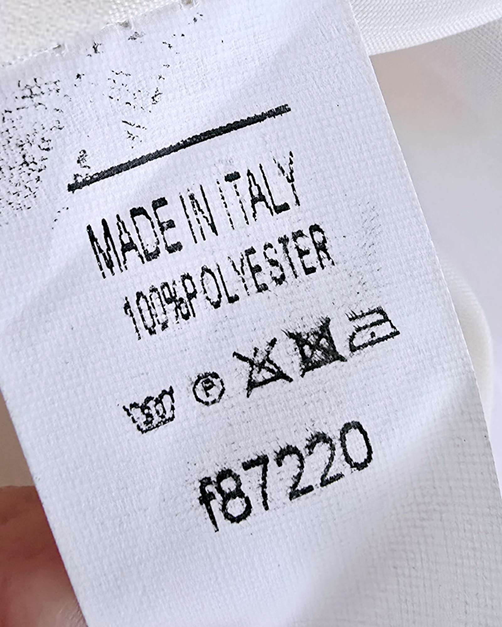 Veste beige à écussons