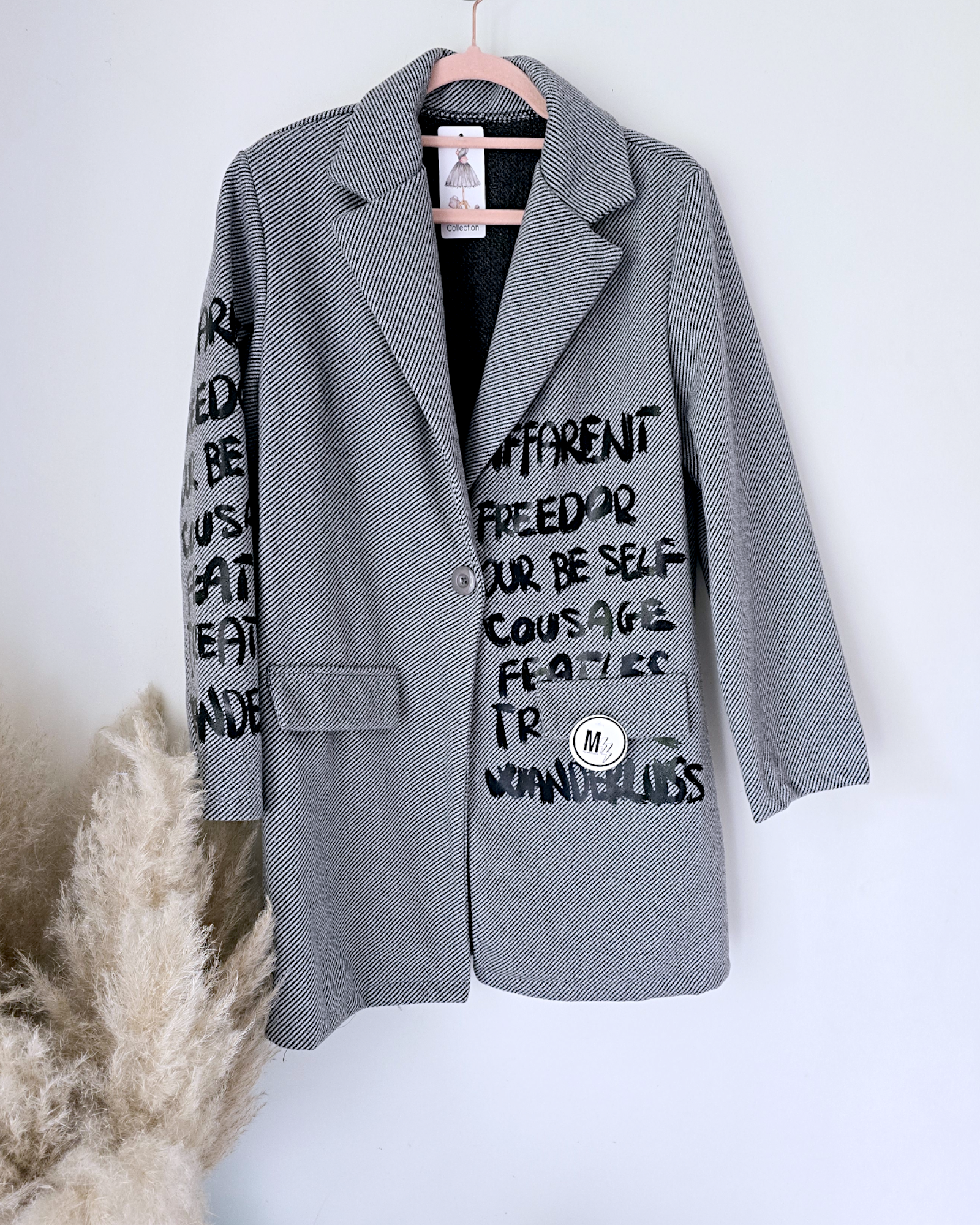 Manteau mi-saison à tag