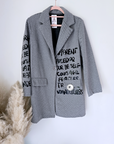 Manteau mi-saison à tag