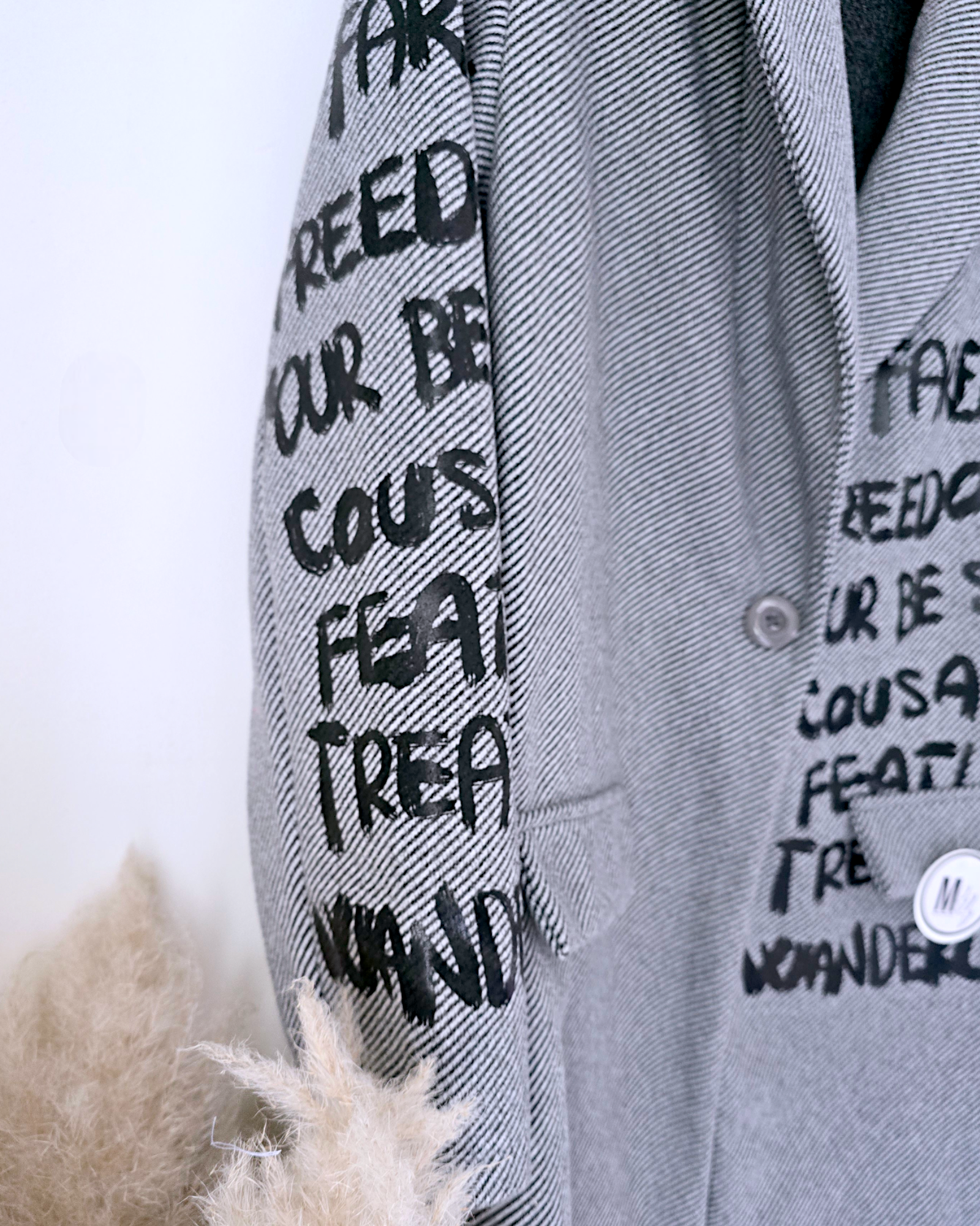 Manteau mi-saison à tag